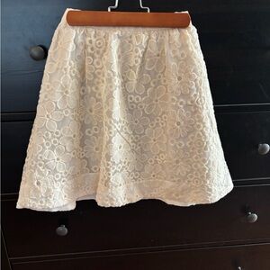 Rhyme Los Angeles Chic Floral Lace Mini Skirt in Cream